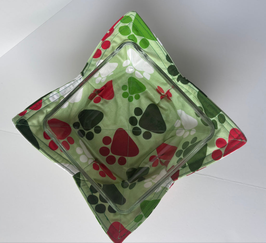 Green and red paw print cozy bowl with a glass dish