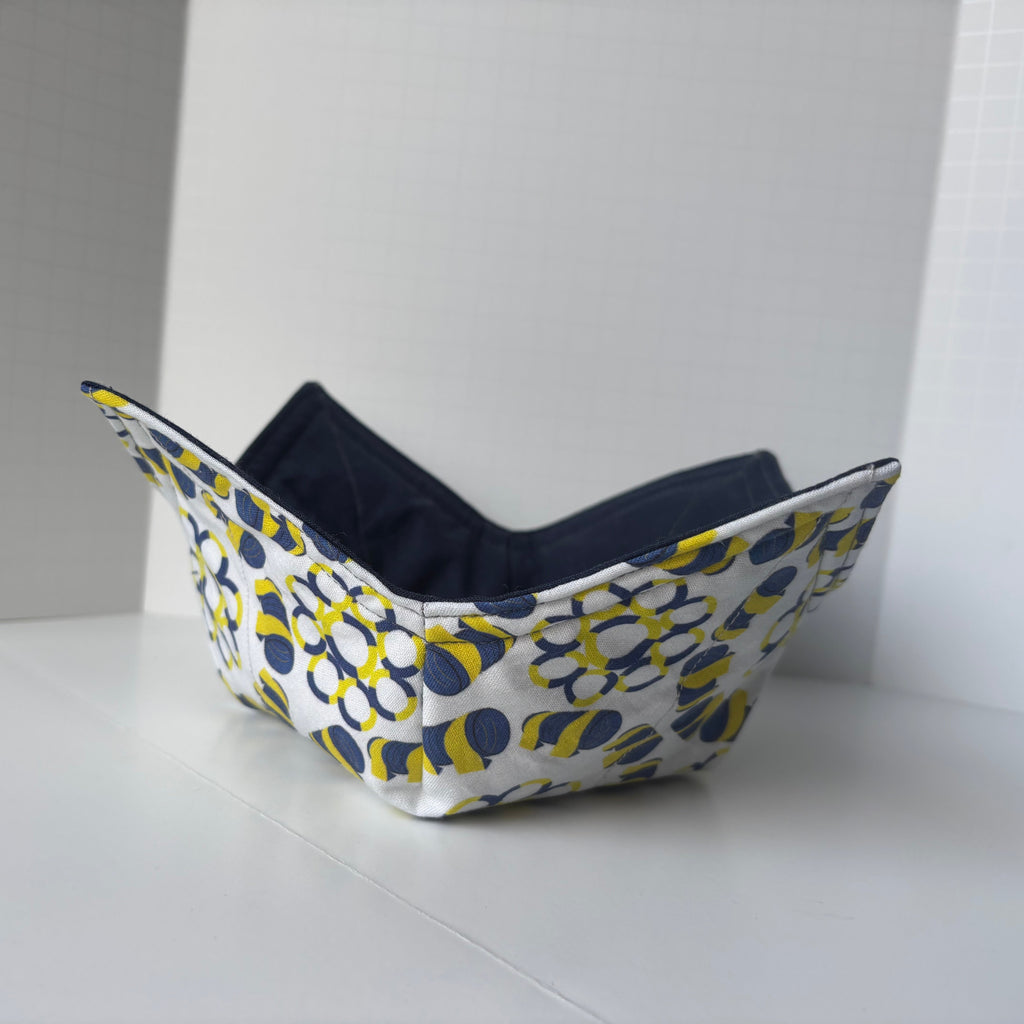 Fabric cozy bowl with agility tires and tunnel design on the outside. 