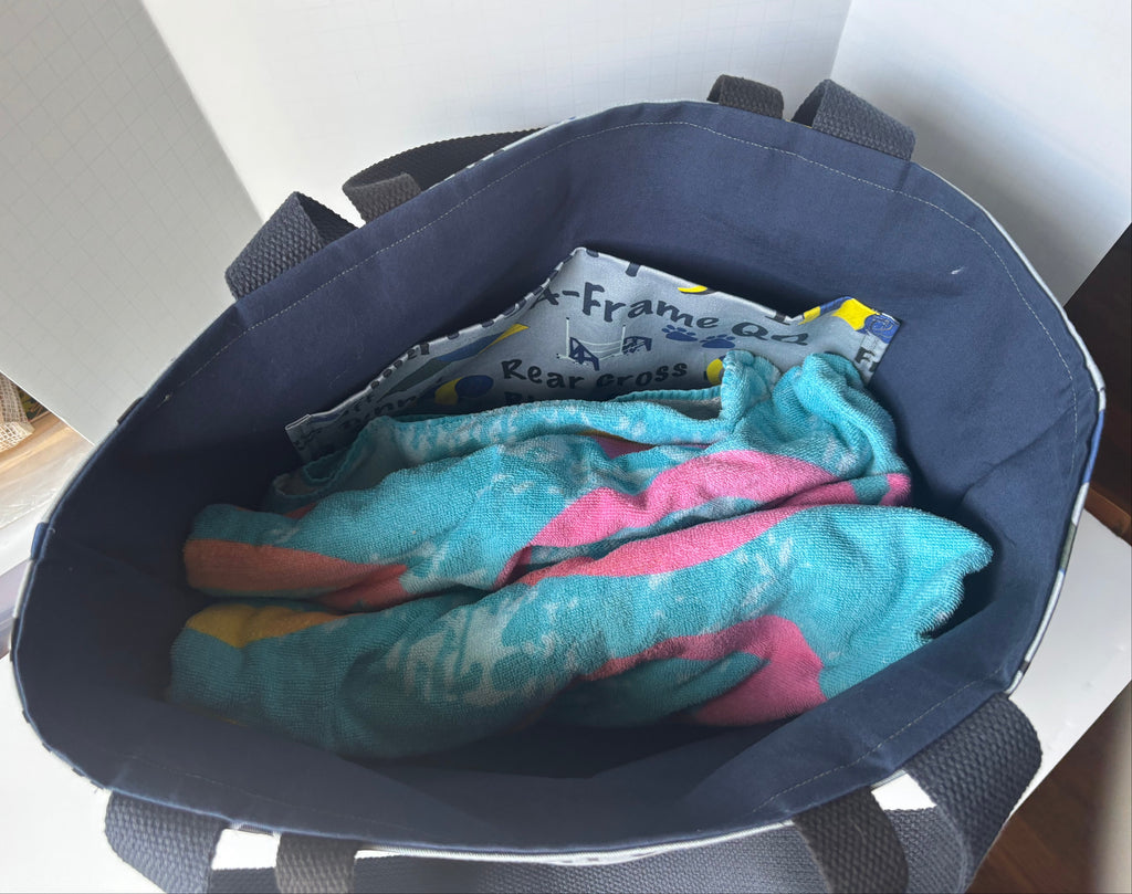 inside of tote bag holding a beach towel